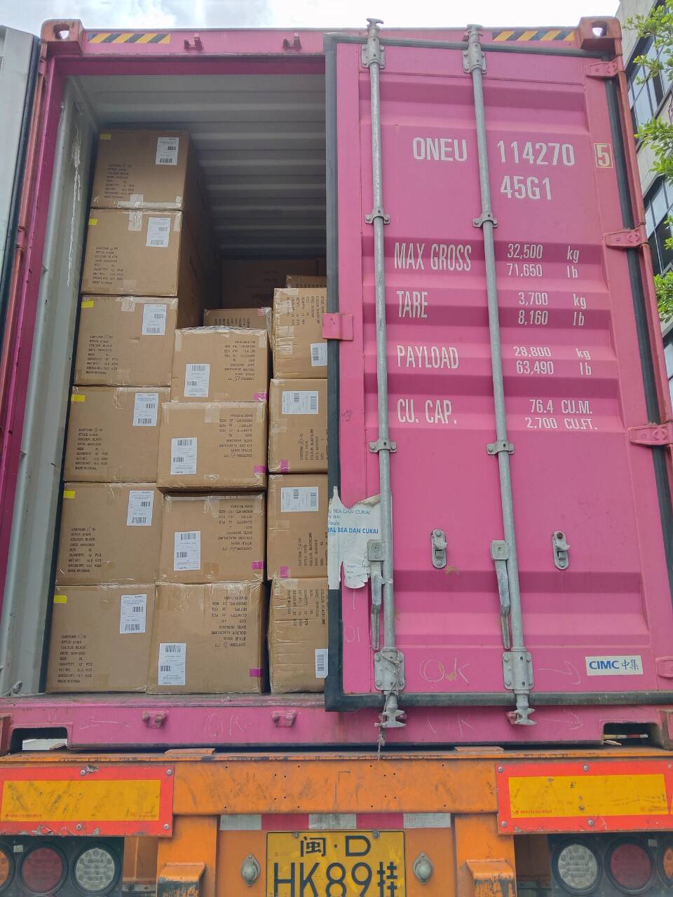 Packed cartons loaded into shipping container